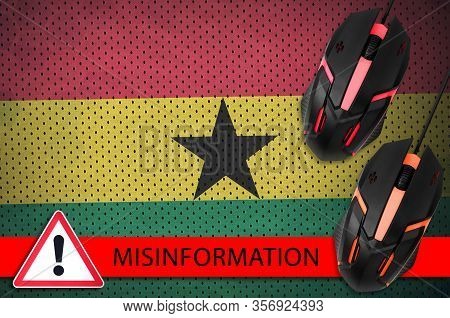 Ghana Flag And Two Computer Mouses. Misinformation During Coronavirus Or 2019-ncov Virus Concept