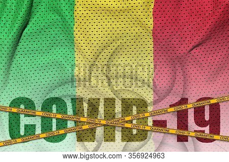 Mali Flag And Covid-19 Inscription With Orange Quarantine Border Tape. Coronavirus Or 2019-ncov Viru