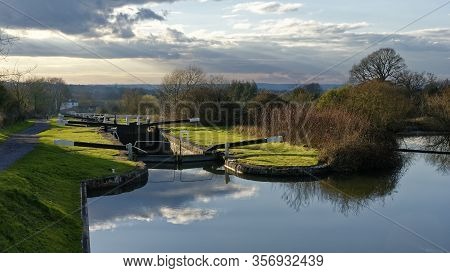 View Down Caen Hill Locks On The Kennet & Avon Canal, Devizes, Wiltshire, Uk