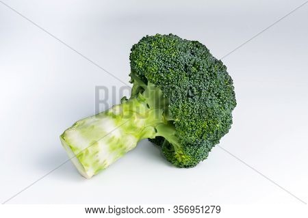 Single Broccoli On White Background With Clipping Path, Copy Space