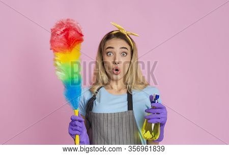 General Cleaning Concept. Surprised Housewife With Spray And Brush, Free Space