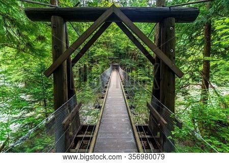 Wooden Suspension Bridge In The Forest. Hiking In The Summer Forest In Japan. Atera In Kiso Valley, 