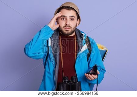 Close Up Portrait Of Young Happy Caucasian Man With Hand On His Forehead, Guy Posing Isoalted Over L