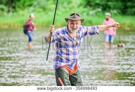 Moments Of Buying Best. Summer Weekend. Fisherman With Fishing Rod. Mature Man Fishing. Sport Activi