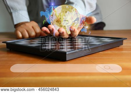 Bit Coin Crypto With Info Graphic Trend World Wild Map On Investor Hand Vver Chess Board. Investing 