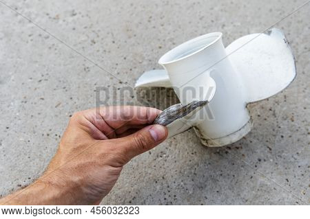 Damaged Motor Boat Propeller. Inspection Of The Damaged Part Of The Boat Engine. Close-up. Unrecogni