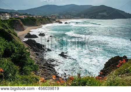 Storm In Atlantic Ocean Bay With Sanly Beach In Bakio, Small Touristic Village Near Bilbao, Basque C