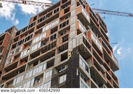 Residential Apartment Or Business Office Building Construction Site With External Wall Facade Insula