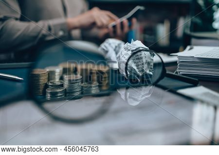 Magnifying Glass See Coin And Fail Paper Crump.  Accounting  Check   Financial Path Concept..