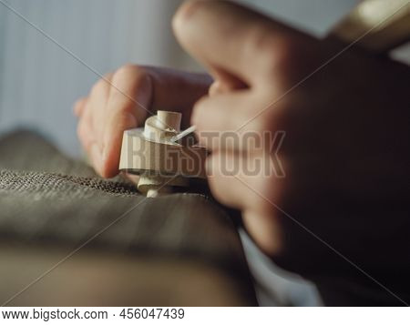 Violinmaker Working On A Handmade Contemporary Stringed Instrument Scroll