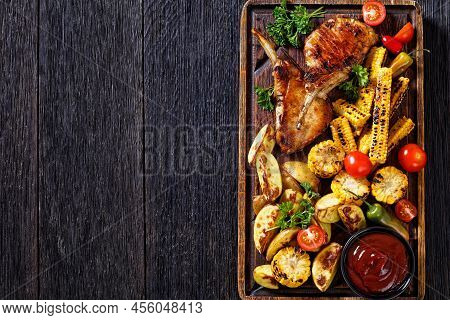Bbq Tomahawk Pork Chops, Bone-in Ribeye With Grilled Corn Disks And Corn Ribs, Wedges Potatoes, Fres