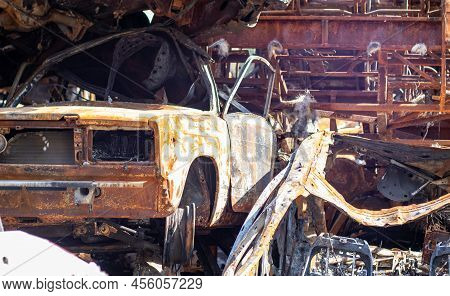 A Lot Of Rusty Burnt Cars In Irpen, After Being Shot By The Russian Military. Russia's War Against U