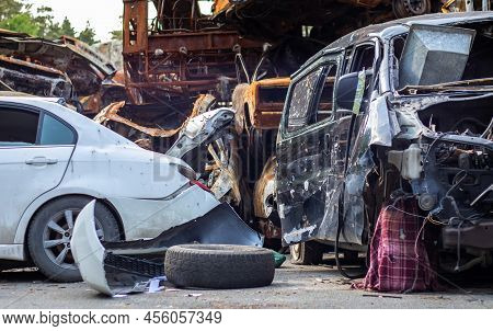 Russian Invasion Of Ukraine In 2022, Destroyed And Burned Cars. Cars Were Beaten With Shrapnel And B