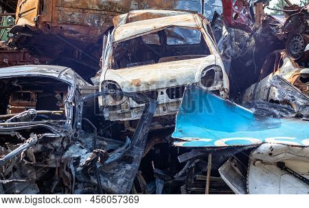 A Lot Of Rusty Burnt Cars In Irpen, After Being Shot By The Russian Military. Russia's War Against U