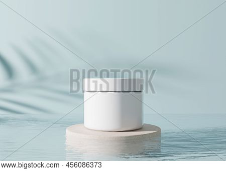 White, Blank, Unbranded Cosmetic Cream Jar With Leaves Shadows And Water On Blue Background. Skin Ca