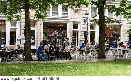 Brussels City Center, Brussels Capital Region - Belgium - 06 20 2020 People Sitting On A Terrace At 