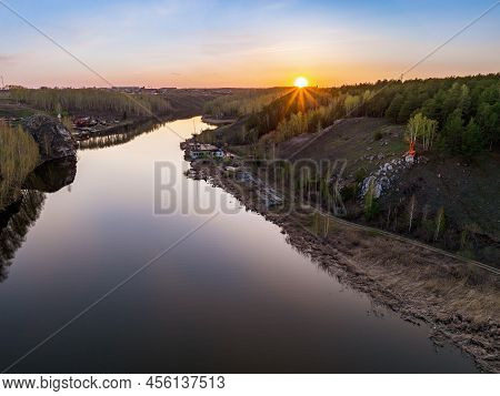 Beauriful Sunset View Along The Iset River And Rocks Near Kamensk-uralskiy. A Scenic Sunset At The R