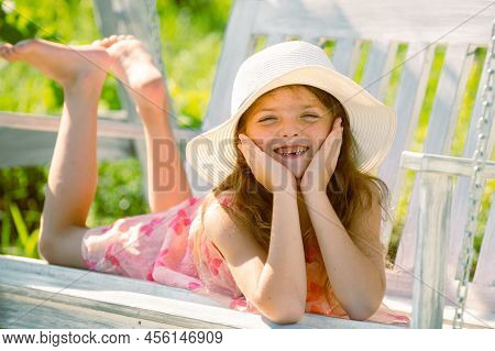 Child Swing On Backyard. Kid Playing Oudoor. Happy Cute Little Girl Swinging And Having Fun Healthy 