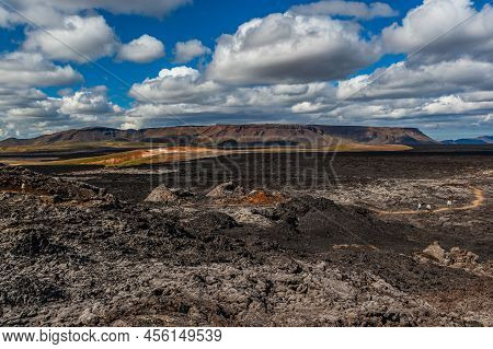 Beautiful Colourful Icelandic Landscape Lava Fields Mountain Geysers Zigzag Road And Moss-covered St