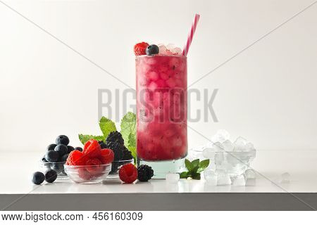 Berries Slush Drink With Fruit And Ice And Isolated Background