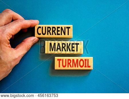 Current Market Turmoil Symbol. Concept Words Current Market Turmoil On Wooden Blocks On A Beautiful 