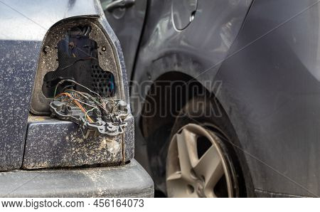 A Broken Car After An Accident Without A Rear Right Headlight. Car Accident Concept. No Tail Light W