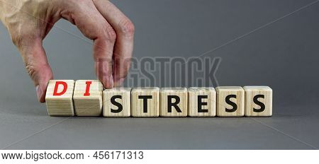 Stress Or Distress Symbol. Psychologist Turns Cubes And Changes The Concept Word Stress To Distress.