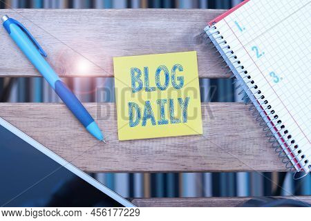 Handwriting Text Blog Daily. Word Written On Daily Posting Of Any Event Via Internet Or Media Tools 