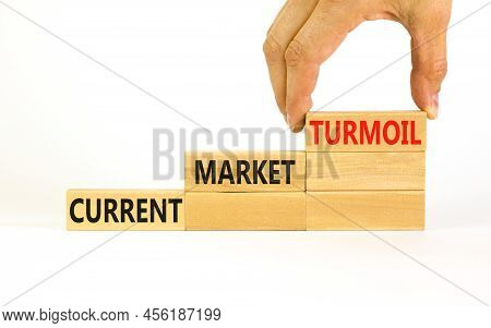 Current Market Turmoil Symbol. Concept Words Current Market Turmoil On Wooden Blocks On A Beautiful 