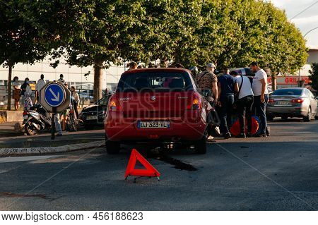 Paris, France - July, ?2021: Car Accident On City Road At Intersection Of Magasin Gifi. People Tryin