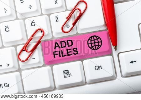 Hand Writing Sign Add Files. Concept Meaning To Put More Information To A Certain Person, Thing, Or 