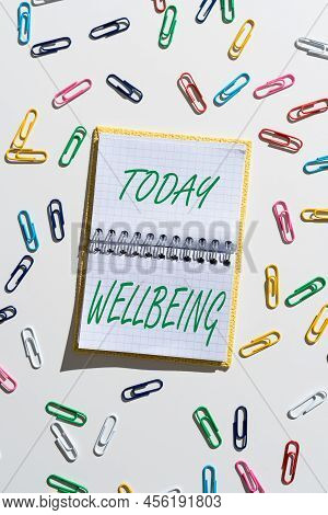 Hand Writing Sign Wellbeing. Word Written On A Good Or Satisfactory Condition Of Existence Including