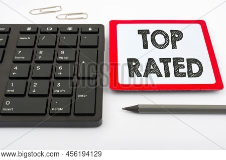 Text Sign Showing Top Rated. Business Concept The High Amount Of A Charge Or Payment Based On Calcul