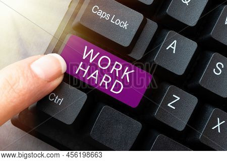 Inspiration Showing Sign Work Hard. Word For Laboring That Puts Effort Into Doing And Completing Tas