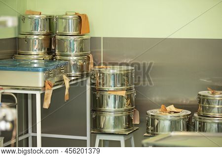 Metal Boxes In The Operating Room. Sterile Boxes For Medical Operation. Hospital Background.