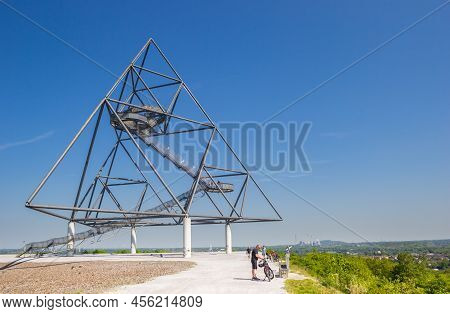Bottrop, Germany - May 09, 2022: Cyclists On Top Of The Hill At The Tetrahedron In Bottrop, Germany
