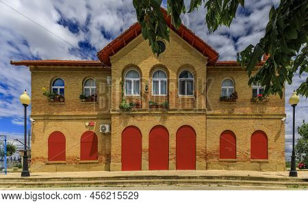 Brick Facade With Red Shutters And Doors Of The Olite Or Erriberri Train Station In Navarra, North O