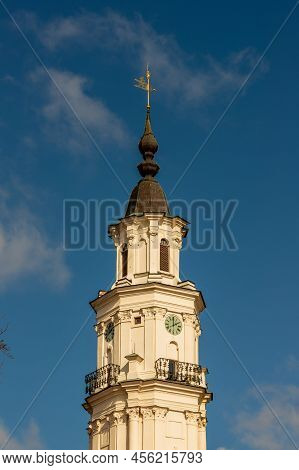 Vertical Photo Of Kaunas City Hall Spire At Sky Background In Lithuania. Baroque Ivory Colour Bell T