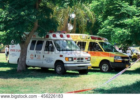 Tel Aviv Yafo, Israel - June 10, 2022.: Car Ambulance Magen David Adom In The Park Under Trees Durin