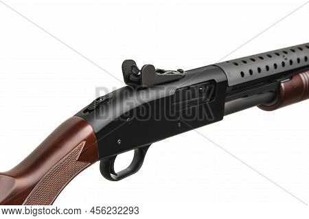 Modern Pump-action Shotgun With A Wooden Butt And Fore-end Isolate On A White Background. Weapons Fo