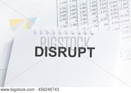 Disrupt Text Text On Notepad On Background Reports, Business Concept