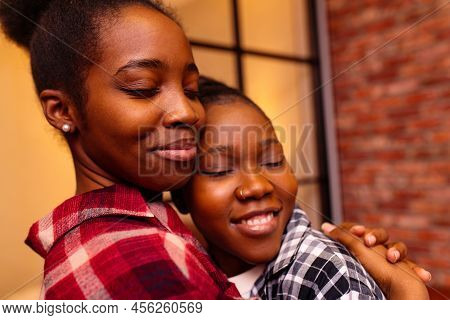 Lesbian Couple Smiling To Each Other And Being In A Romantic Mood