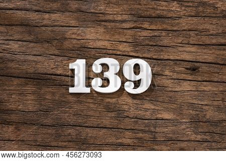 Number 139 - Piece On Rustic Wood Background