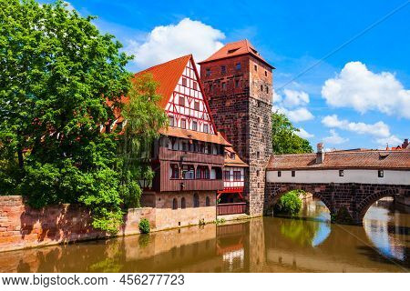Wasserturm Tower, Weinstadel Medieval House And Henkerbrucke Bridge At Pegnitz River In Nuremberg Ol