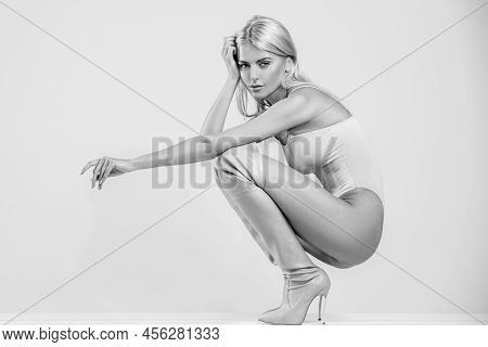 Beautiful Fashionable Woman In High Heel Boots Posing In Studio. Outfit Detail Of Fashion Stylish Wo
