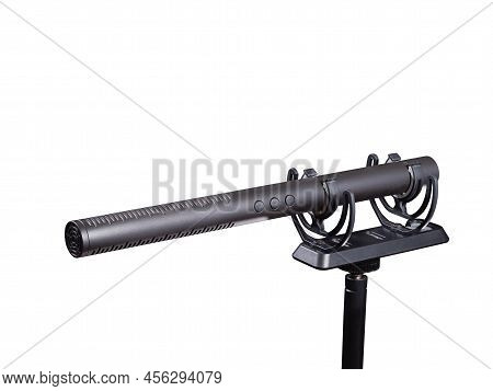 Microphone gun on a shock mount isolated on white background