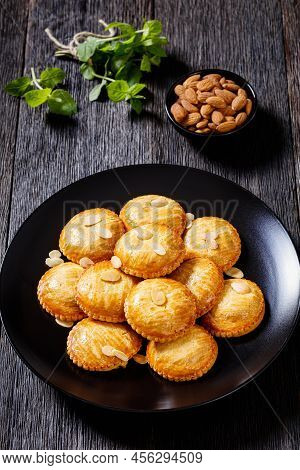 Almond Butter Cookies Filled With Marzipan And Almonds Nuts Paste, Gevulde Koek, On Black Plate On D