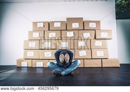 Man With Anxiety And Ocd Disturb In Front At Boxes