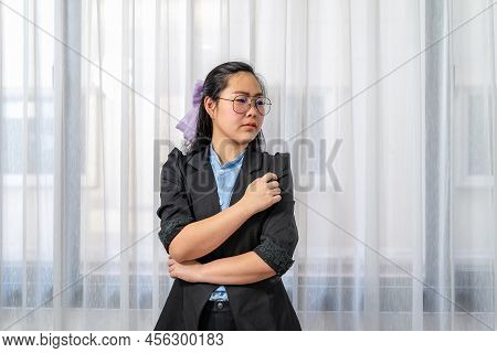 Little Entrepreneur Asian Eyeglasses Woman With Confident Pose In Black Suit Stands In Front Of Wind