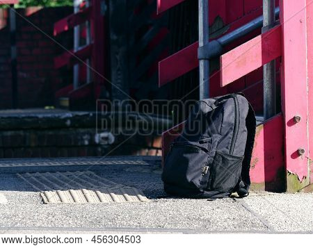 Rucksack Left On Railway Platform Medium Shot